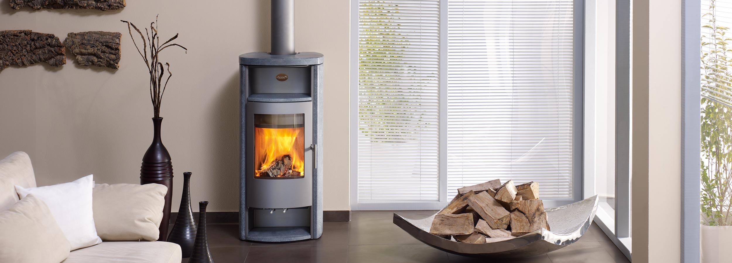 HASE Kaminofen Jena Speckstein Wohnraumbild modern